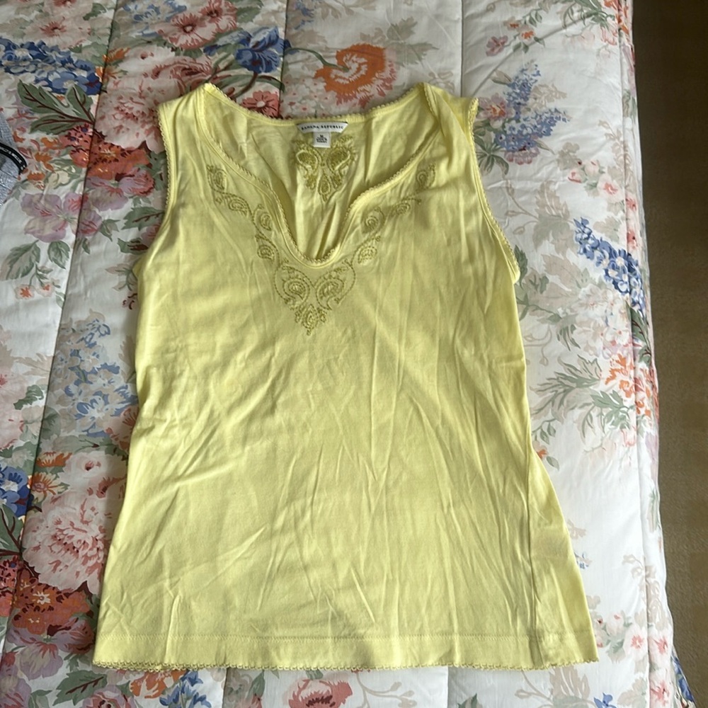 Yellow V-neck tank top with cute decorative stitching